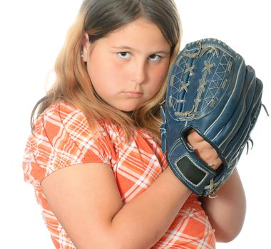 A closeup view of a preteen girl wearing casual clothing is playing catch with a ball and mitt, isolated against a white background.