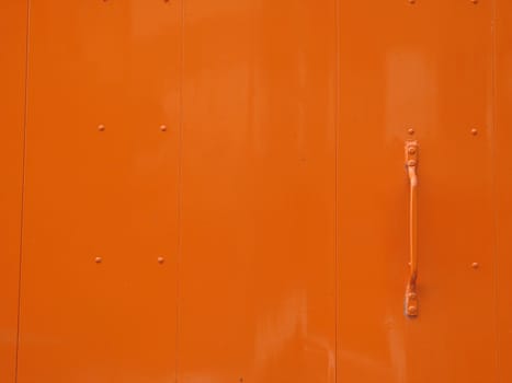 slick orange metal door