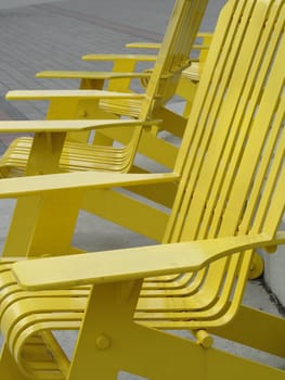 yellow metal outdoor chair