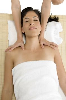 white woman receiving massage on an isolated background