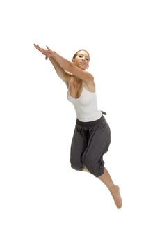 caucasian woman leaps in air