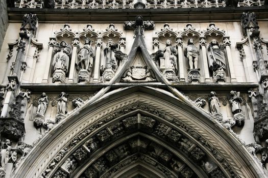 Ornamental portal above the entrance to Cathedral Notre-Dame in Lausanne, Switzerland