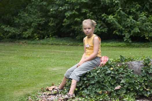 Portrait of girls in the open air on the blur background 