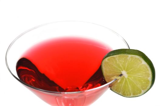 Red Cosmopolitan with lime slice isolated on white background. 