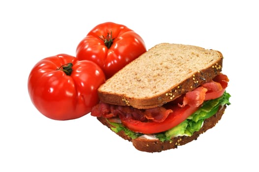 Bacon, lettuce, and tomato sandwich with tomatoes.  Isolated on white background with clipping path.