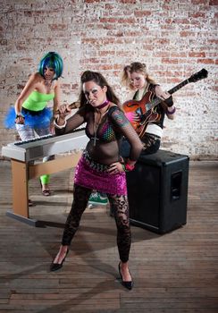 Young all girl punk rock band trio