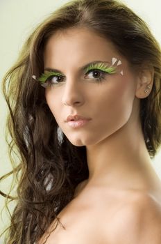 nice portrait of a cute girl with long hair and green eyelashes