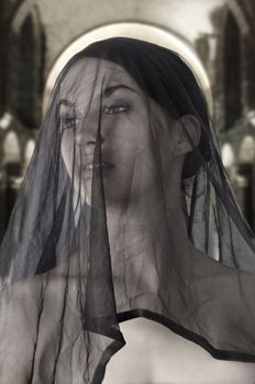 attractive widow with a black transparent veil on face