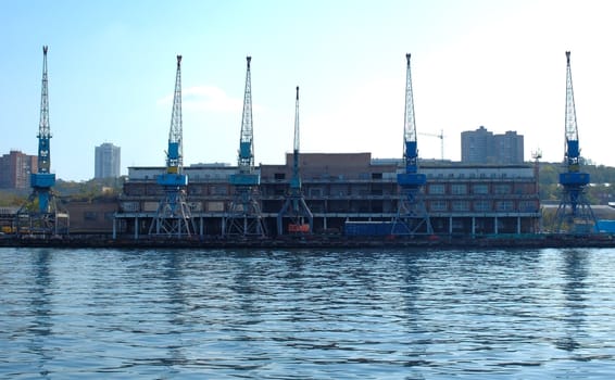 Old shipment pier (stage) in russian seaport (Vladivostok).