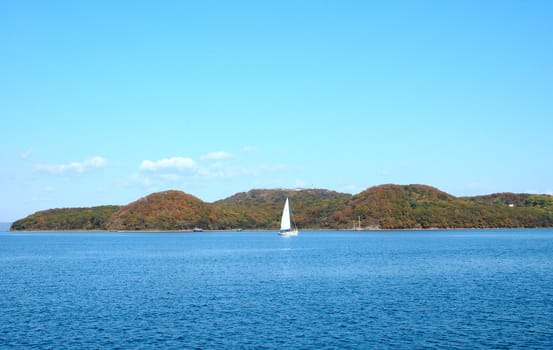 Bright blue sea scenery near russian seaport Vladivostok.