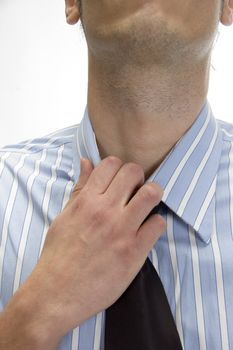 adult man itching his neck with white background