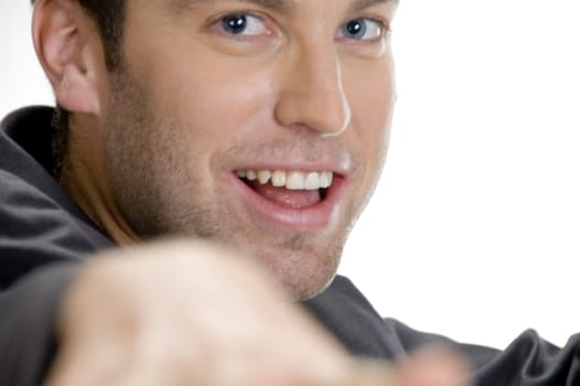 happy man looking at camera against white background