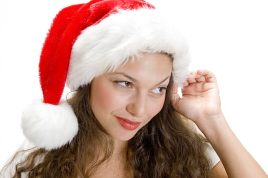 pretty female holding santa cap