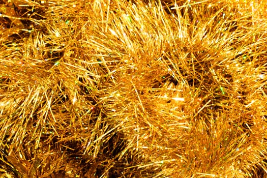 Sparkling yellow Christmas tinsel background