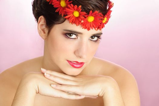 Woman with flower crown, pink background