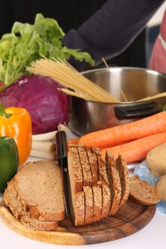 bread, carrot, red cabbage and peppers in close up