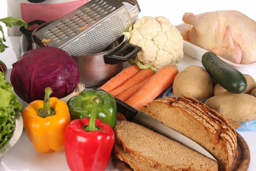 bread, carrot, red cabbage and peppers in close up