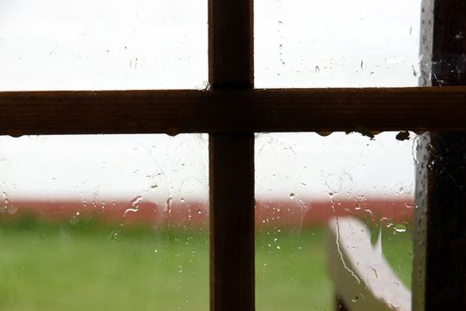 looking out on a stormy day through a wet window