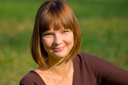 Portrait of the huppy young girl