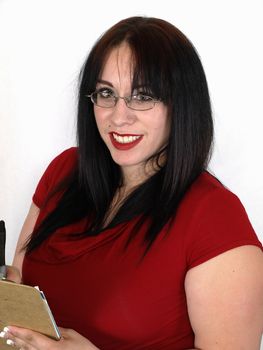 Pretty young pierced adult woman with a clipboard on a white background.