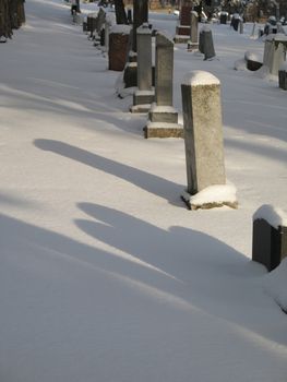 snow on a cemetery