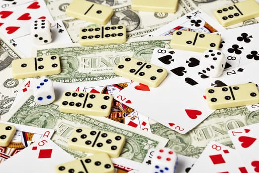 Playing cards, money, dominoes and dices