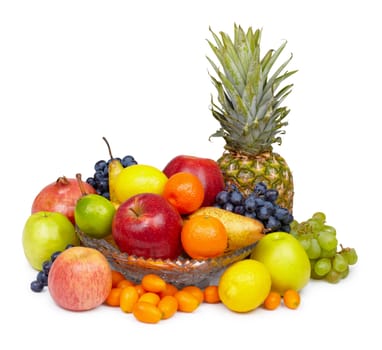 Still life - pineapple, apples and other fruits on white background