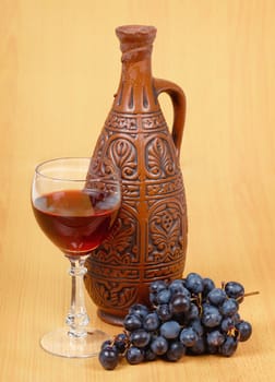 Still Life - ceramic jug and a glass of wine