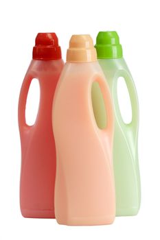 Bottles of laundry detergent and fabric softener on a white background