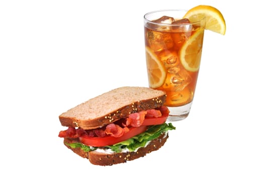 Bacon, lettuce, and tomato sandwich with iced tea with lemons.  Isolated on white background with clipping path.