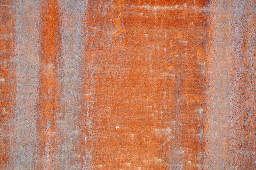 Reddish stone background with texture detail.