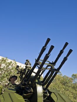 MALTA- OCTOBER 06 - Soldiers demonstrating an Anti-Aircraft Gun during an Armed Forces of Malta open day at Luqa Barracks