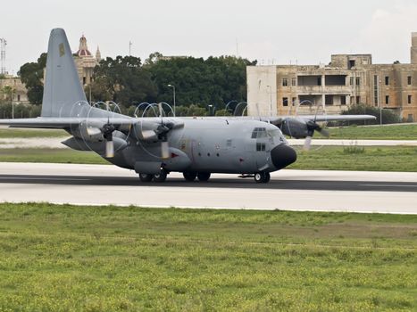 MALTA - OCTOBER 08 2008 - A Spanish Air Force Hercules C130 taking off from Luqa Airport in Malta