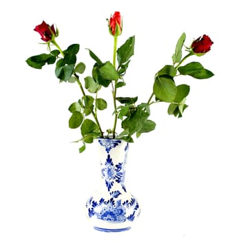 three colorful roses in a vase