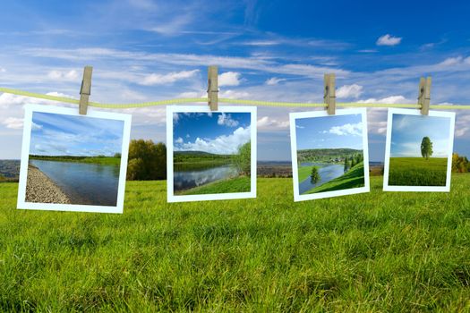 Landscape photographs hanging on a clothesline