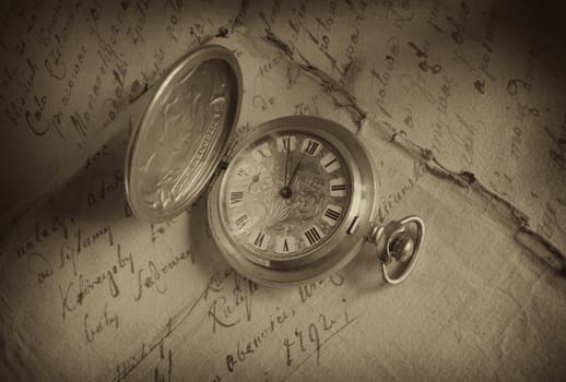 Old-time watch,current of time,tone sepia