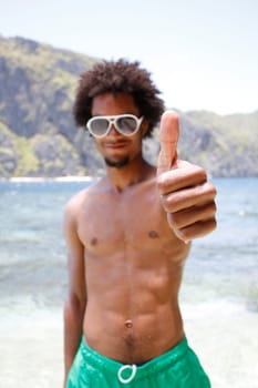 Happy guy on the beach