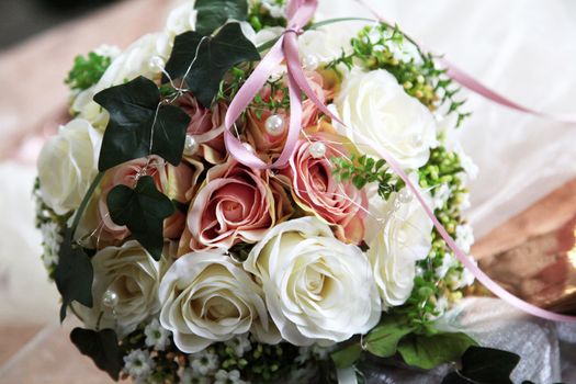 Elegant Bride flowers-bouquet with white and yellow roses and pearl - Close-up