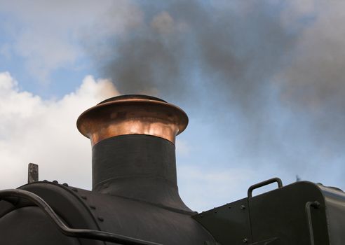 Smoke from the funnel of a restored steam locomotive