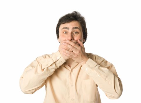 Man covering his mouth with hands, white background