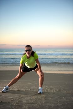 Woman doing exercises during sunset with sunglasses in Florianopolis, Santa Catarina, Brazil, Nikon D3S, Nikon 24-70mm, RAW shooting.