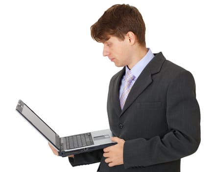 The businessman with the portable computer in hands on a white background