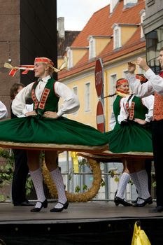 Traditional Latvian folk dancing, performed at the Riga city hall, Latvia, September 27, 2008