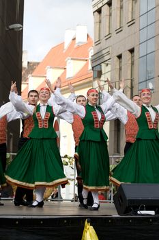 Traditional Latvian folk dancing, performed at the Riga city hall, Latvia, September 27, 2008