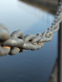 Steel circuit above water on quay   