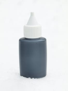 Black tube on a snow in the winter 