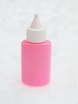 Pink tube on a snow in the winter      