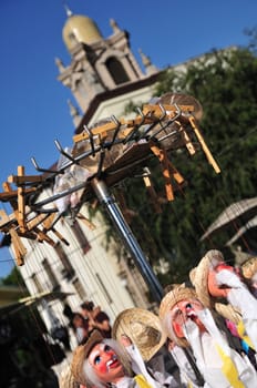 Traditional Mexican marionettes in front of the Plaza Methodist Church