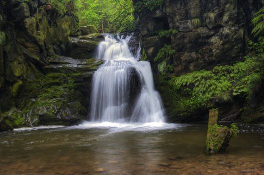 Shot of the fall of water.
Stream Huntava - natural area - nature preserve.
Resov, Czech republic, Europe.