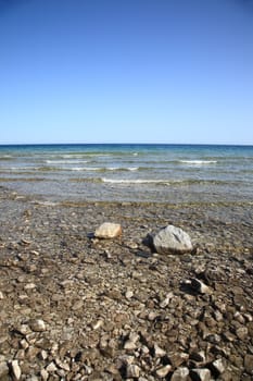 Waves reach rocky shoreline of Great Lake